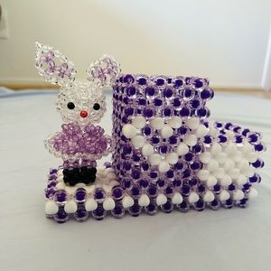 A cute little bunny pencil holder handmade beads in shades